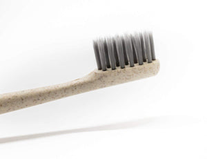 HAPPY BIODEGRADABLE CHARCOAL TOOTHBRUSH - 1 unit